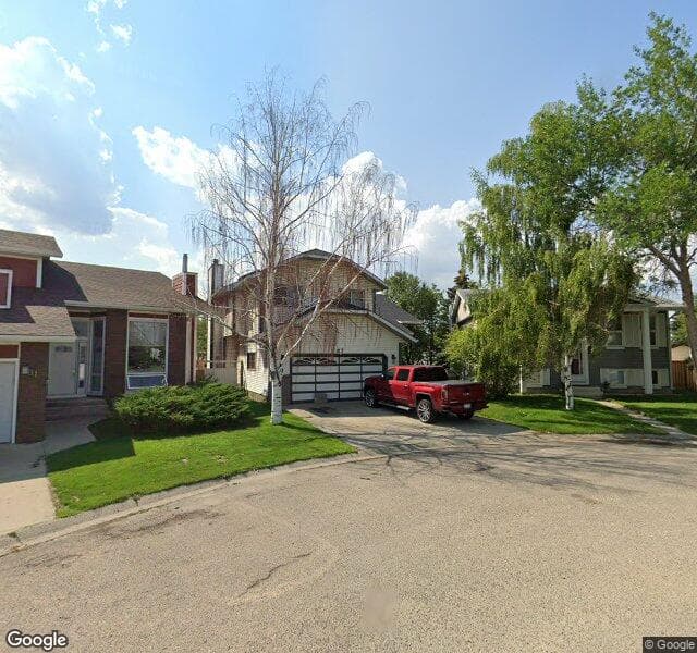 Street view of 87 Riverglen Way SE, Calgary