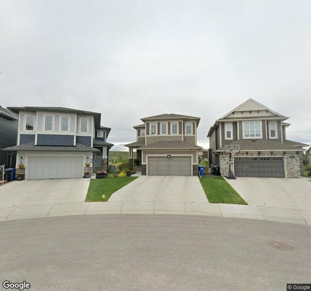 Street view of 61 Cranbrook Cove SE, Calgary