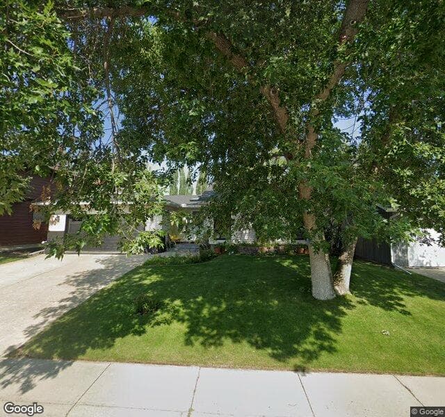 Street view of 208 Oakside Bay SW, Calgary