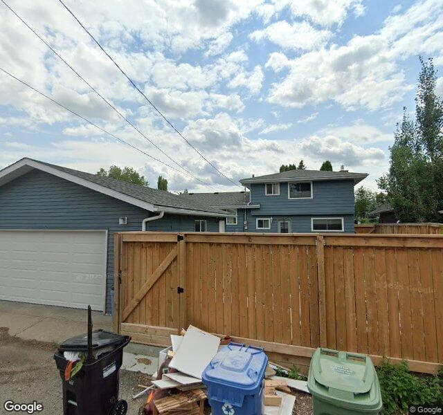 Street view of 1124 Lake Sundance Crescent SE, Calgary