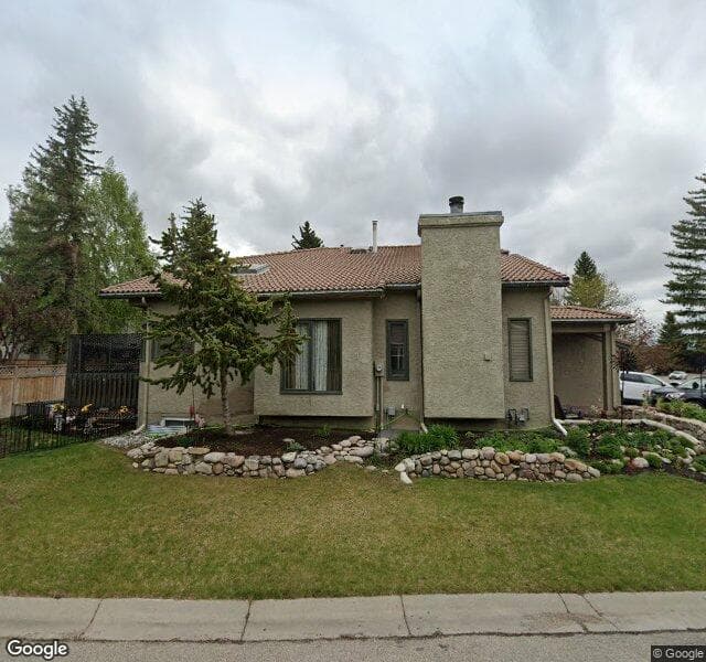 Street view of 832 Shawnee Drive SW, Calgary