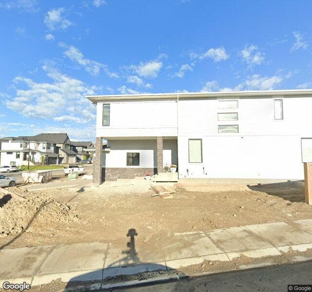Street view of 316 Spring Creek Circle SW, Calgary