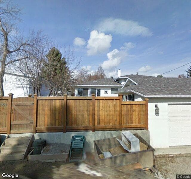 Street view of 68 Woodlark Drive SW, Calgary