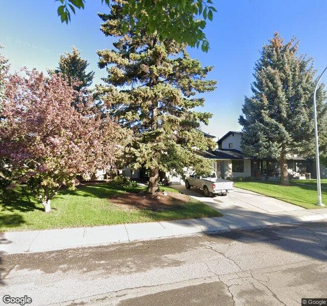 Street view of 43 Lake Geneva Place SE, Calgary