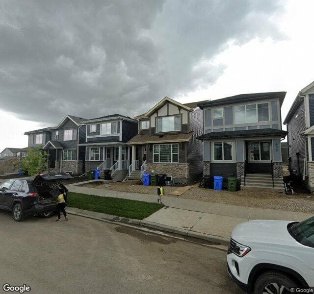 Street view of 886 Creekside Boulevard SW, Calgary