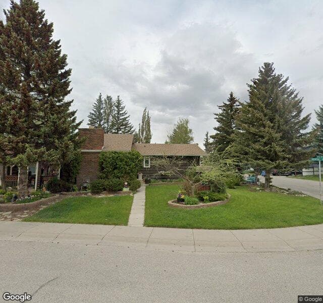 Street view of 2240 Deer Side Drive SE, Calgary