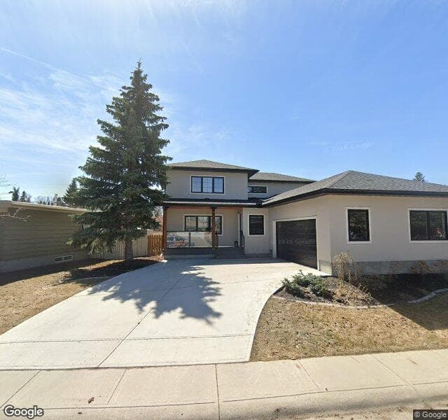 Street view of 840 Lake Twintree Crescent SE, Calgary