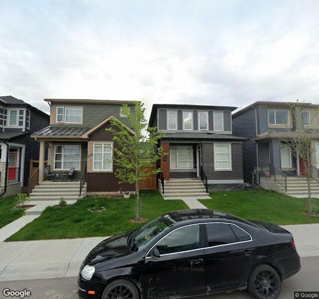 Street view of 374 Wolf Creek Manor SE, Calgary