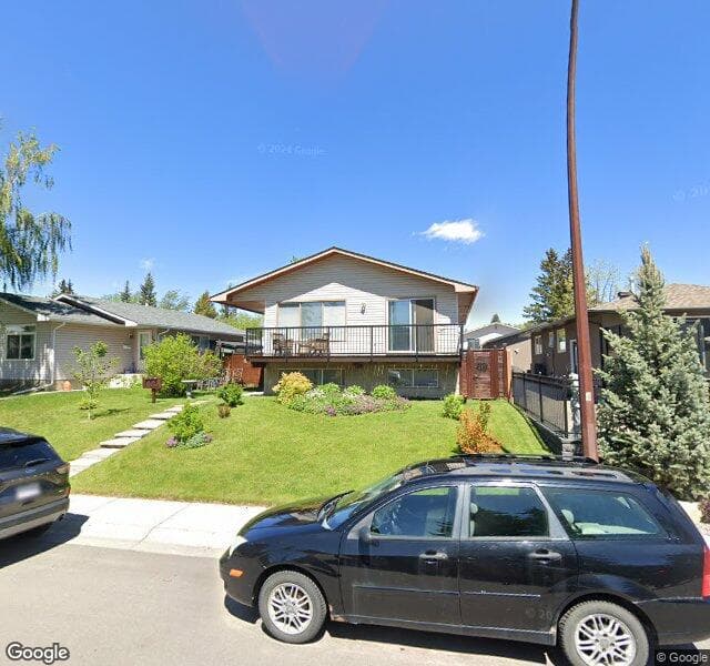 Street view of 108 Woodvale Road SW, Calgary