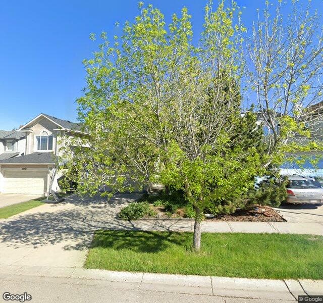 Street view of 1051 Tuscany Drive NW, Calgary