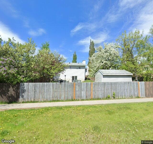 Street view of 16 Woodstock Way SW, Calgary