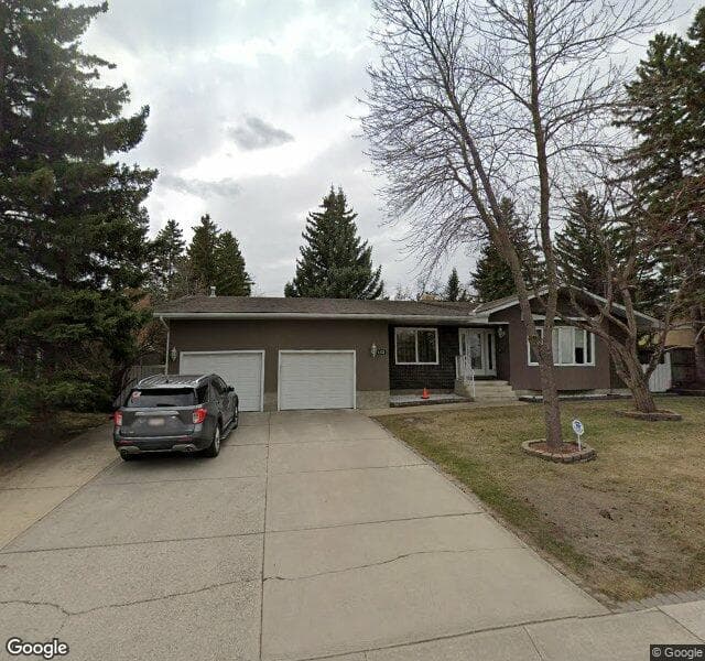 Street view of 423 Lake Bonavista Drive SE, Calgary