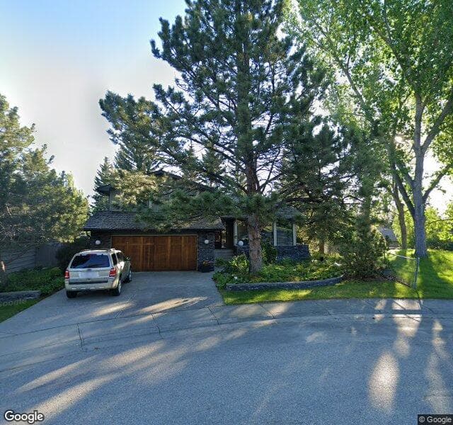 Street view of 111 Oakside Place SW, Calgary