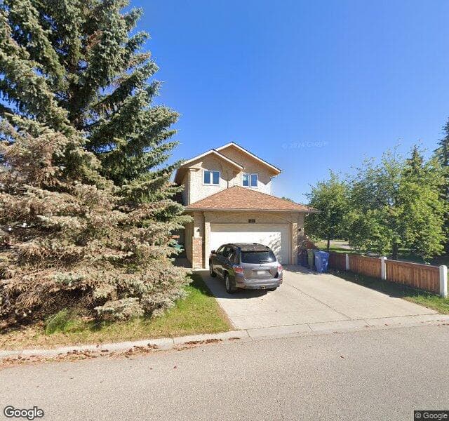 Street view of 32 Hawktree Circle NW, Calgary