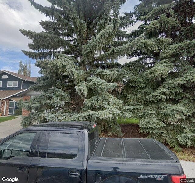 Street view of 1252 Deer River Circle SE, Calgary