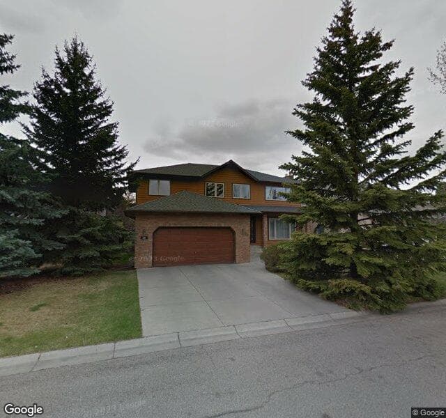Street view of 19 Woodgreen Crescent SW, Calgary