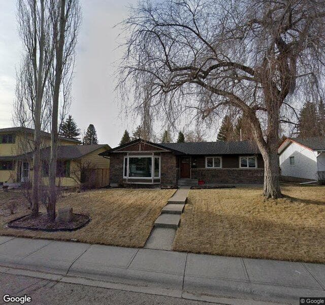 Street view of 1019 Lake Christina Way SE, Calgary