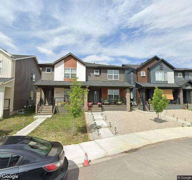 Street view of 283 Wolf Creek Way SE, Calgary