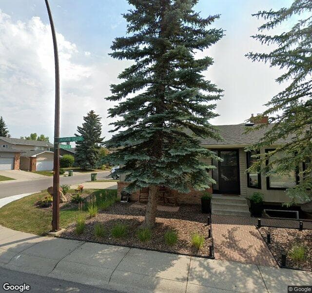 Street view of 27 Woodmont Drive SW, Calgary