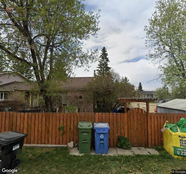 Street view of 296 Sandstone Place NW, Calgary