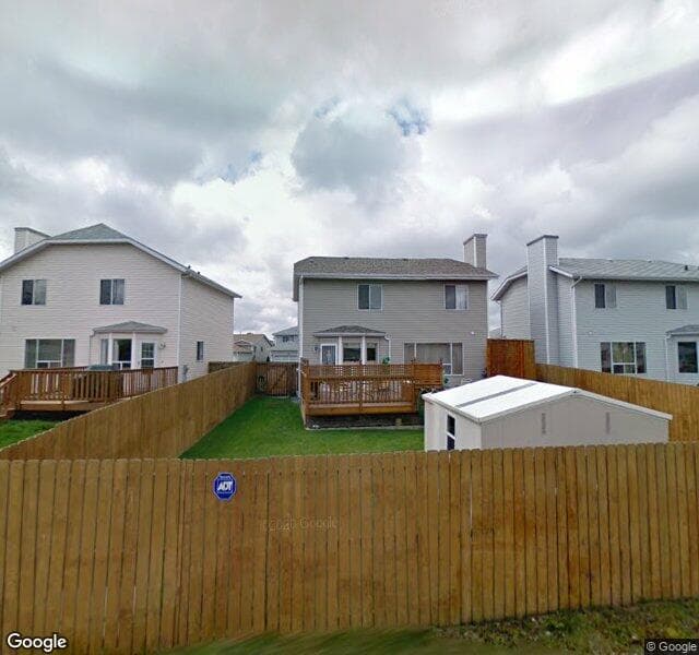 Street view of 136 Riverglen Drive SE, Calgary