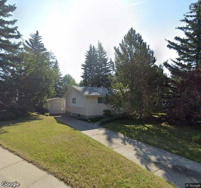 Street view of 10416 Saxon Place SW, Calgary