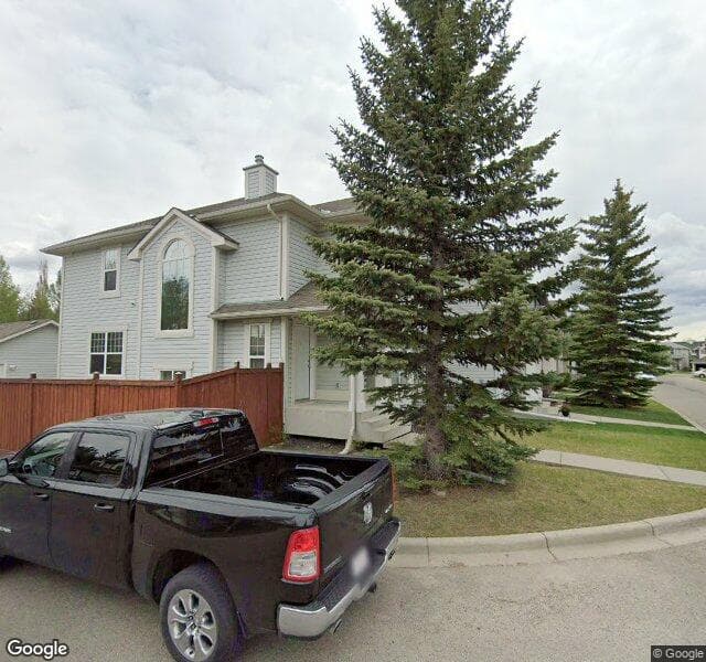Street view of 138 Rocky Ridge Green NW, Calgary
