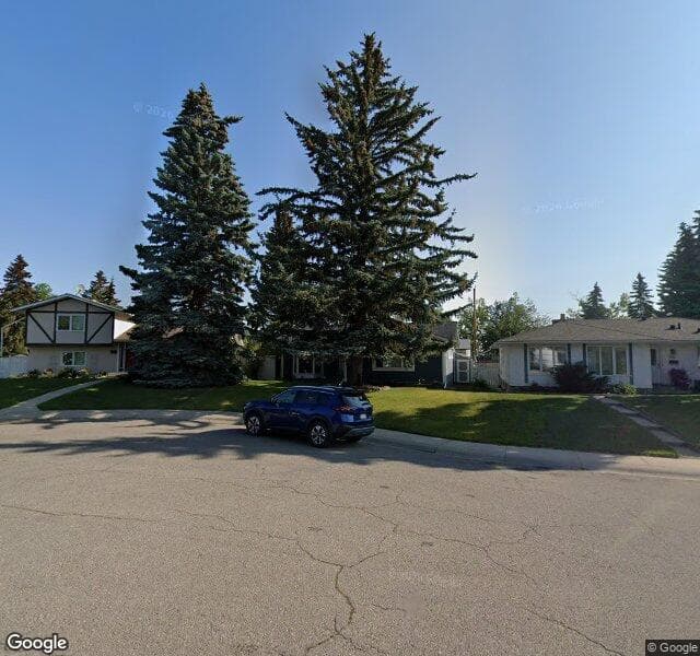 Street view of 812 Lake Emerald Place SE, Calgary