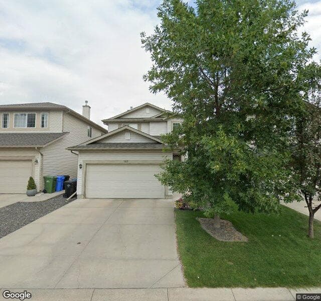 Street view of 143 Tuscany Meadows Heath NW, Calgary