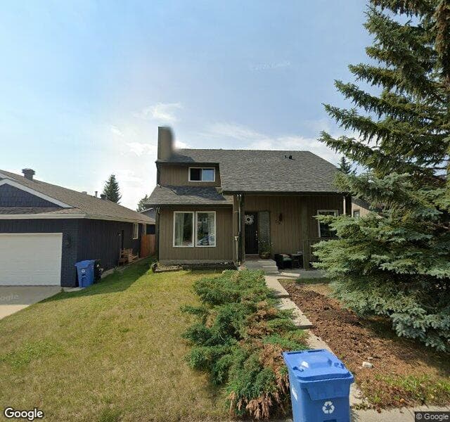 Street view of 15 Woodmont Drive SW, Calgary