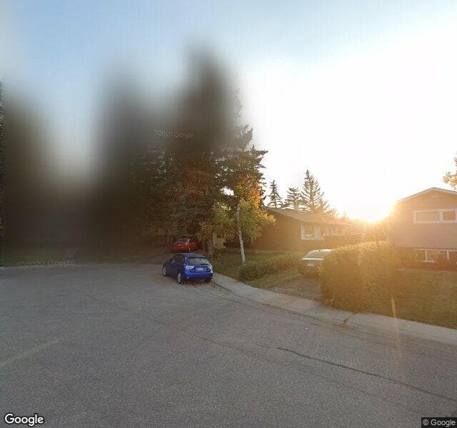 Street view of 50 Hallbrook Place SW, Calgary