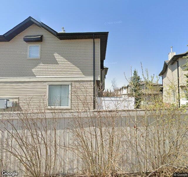 Street view of 98 Saddlebrook Point NE, Calgary