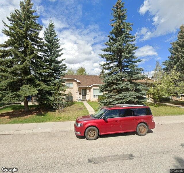 Street view of 16285 Shawbrooke Drive SW, Calgary