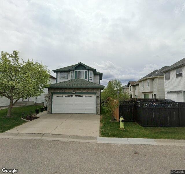 Street view of 99 Rocky Ridge Green NW, Calgary