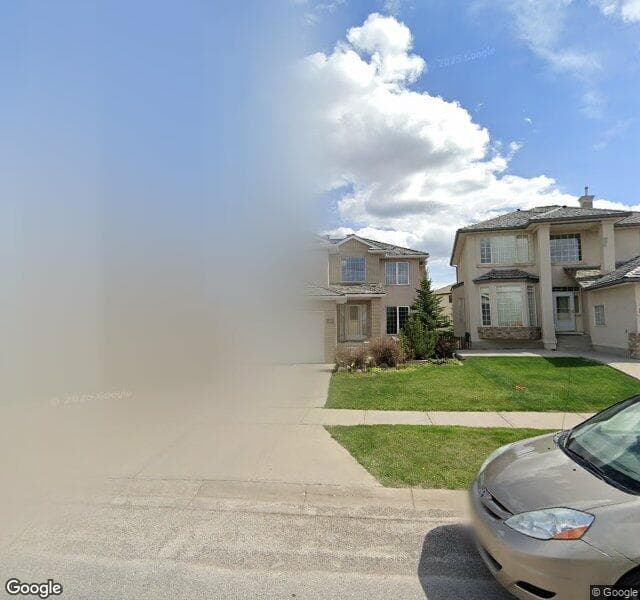 Street view of 10473 Hamptons Boulevard NW, Calgary