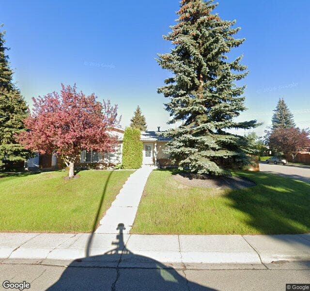 Street view of 215 Lake Wapta Rise SE, Calgary