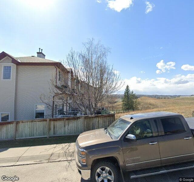 Street view of 183 Hidden Creek Cove NW, Calgary