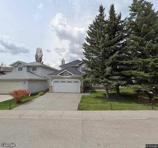 Street view of 114 Sunvista Crescent SE, Calgary