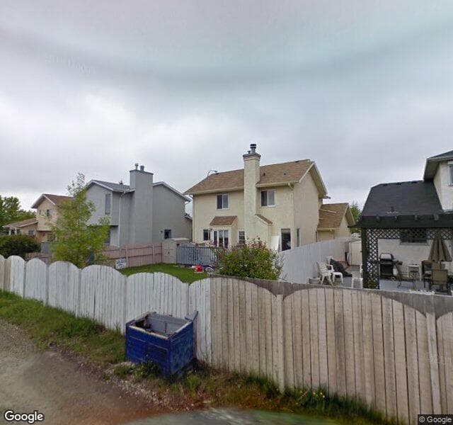 Street view of 83 Riverbend Drive SE, Calgary