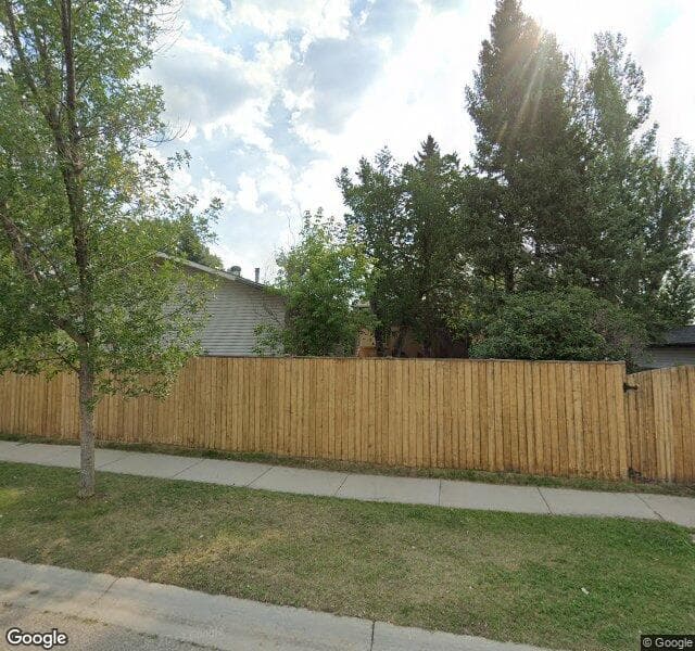 Street view of 732 Woodpark Boulevard SW, Calgary