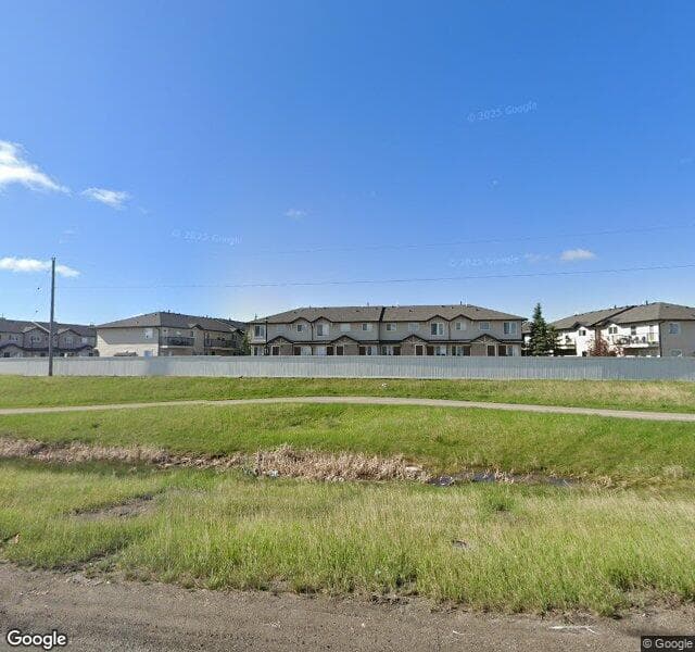 Street view of 300 Saddlebrook Point NE, Calgary