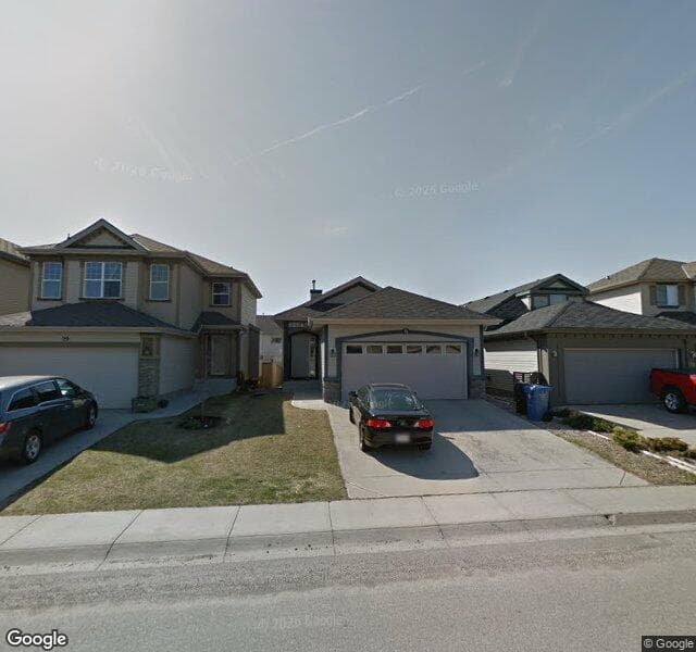Street view of 25 Covehaven Gardens NE, Calgary
