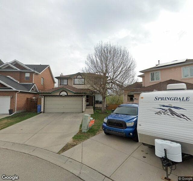 Street view of 115 Hidden Ranch Place NW, Calgary