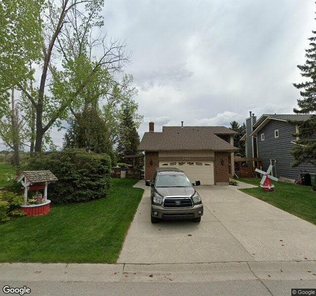 Street view of 2407 Deer Side Drive SE, Calgary