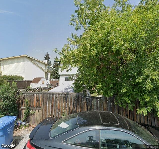 Street view of 27 Woodhill Court SW, Calgary