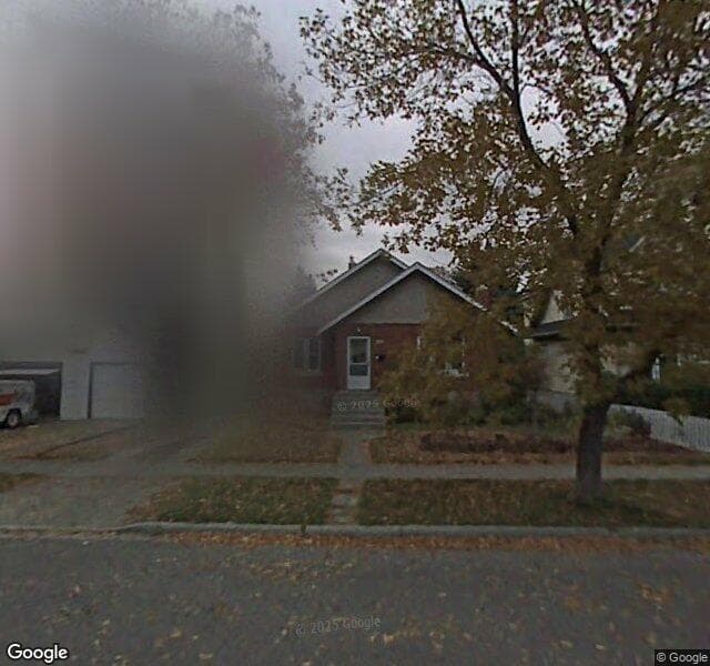 Street view of 1428 2 Street NW, Calgary