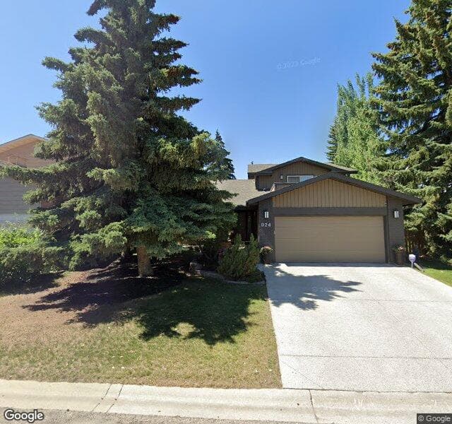 Street view of 924 Coach Side Crescent SW, Calgary