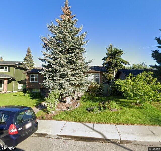 Street view of 784 Lake Twintree Crescent SE, Calgary