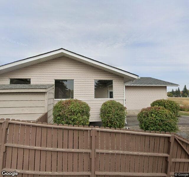 Street view of 1303 Lake Ontario Drive SE, Calgary