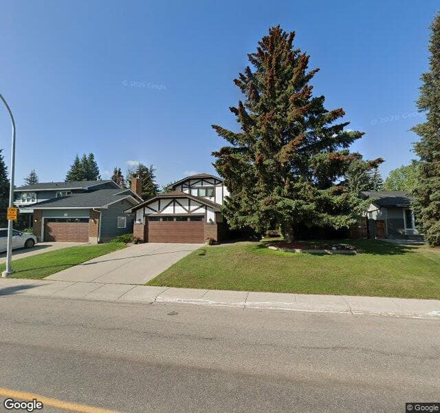 Street view of 2228 Lake Bonavista Drive SE, Calgary